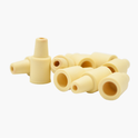 Set of beige pheromone lures on a white background